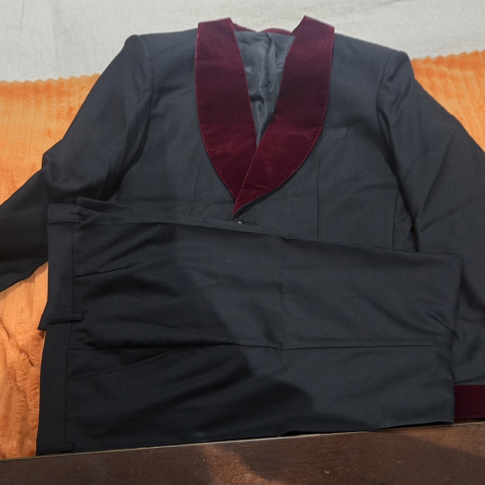 Ilse Crawford Black Suit with Burgundy Accents